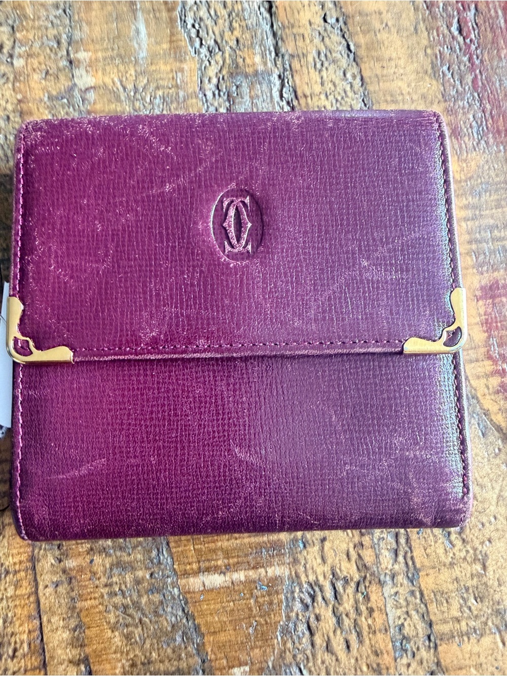 Cartier Plum Leather Compact Wallet with Gold Corner Details